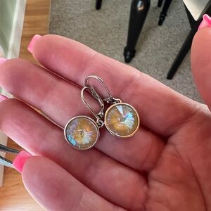 Touchstone Crystal l, silver setting.  Ochre Delite stone.